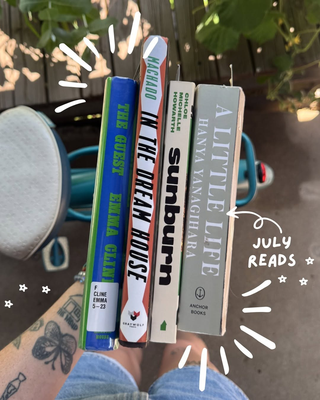 July reads social media post with a stack of books