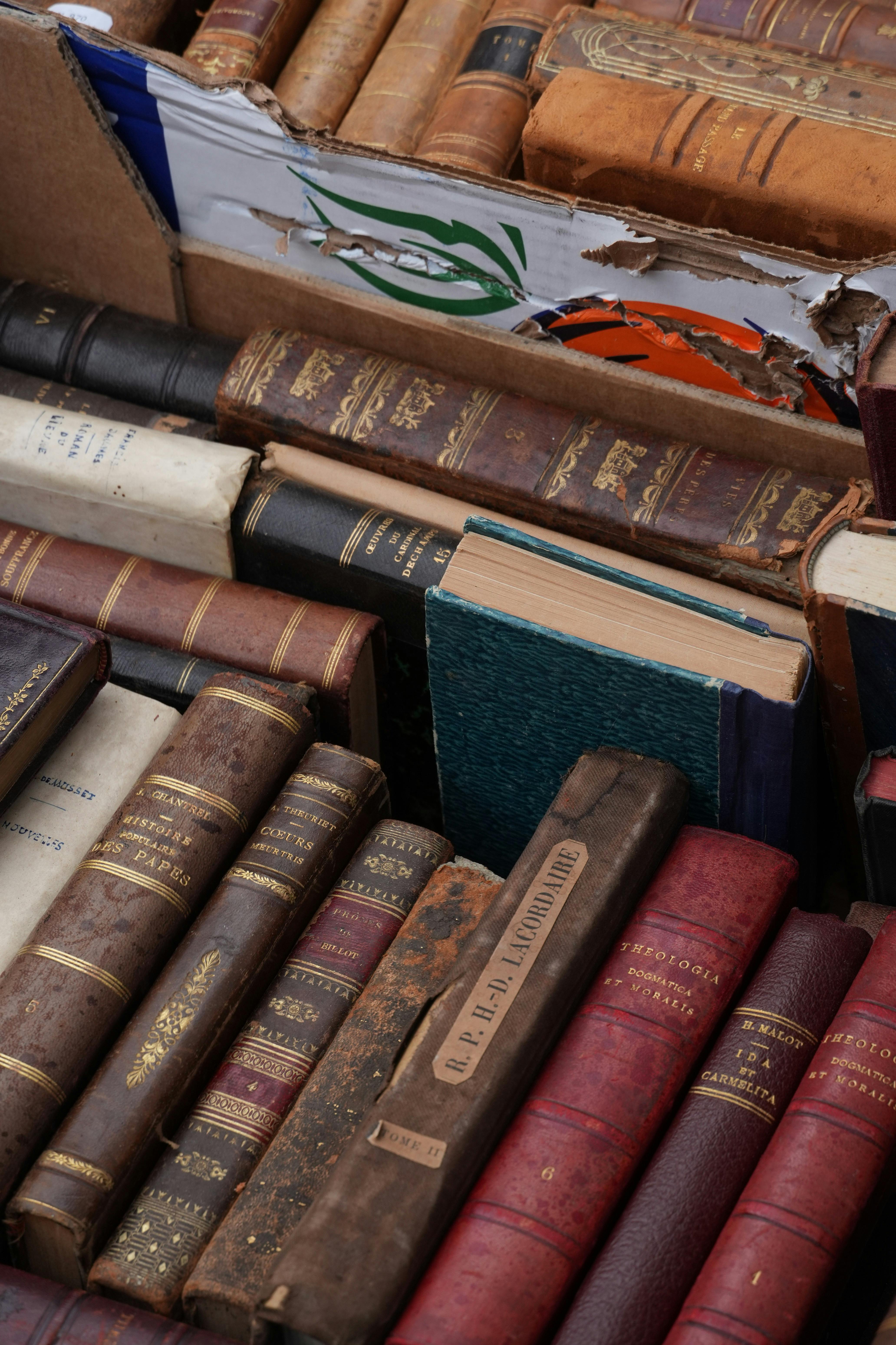 Vintage books stacked closely together